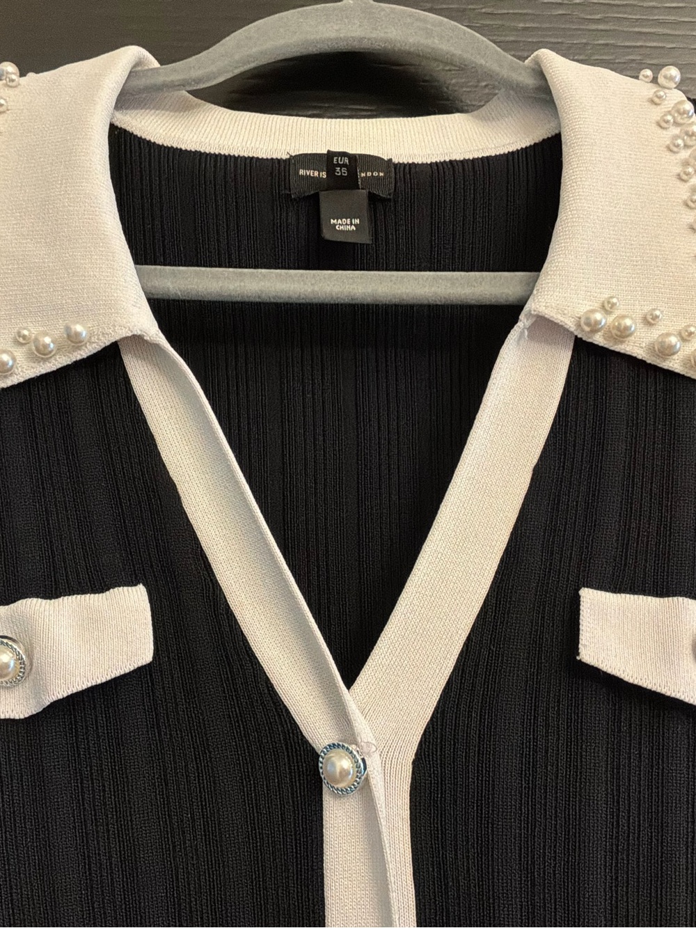 Black Ribbed Button-Front Sweater with White Trim and Studded Collar